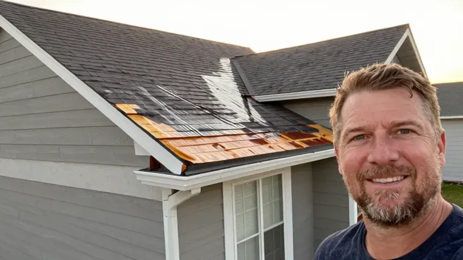 Documentary-style iPhone photo of completed emergency roof repair with stabilized and restored roofing system in Saratoga Springs, Utah. Natural daylight.
